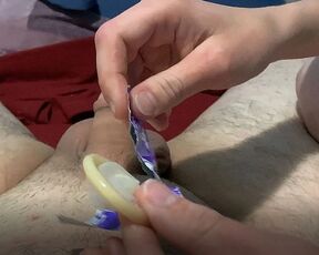She jerks me off with a condom and I cum inside