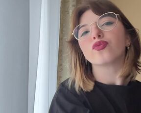 Attractive brunette in a t-shirt shows off her beautiful tits